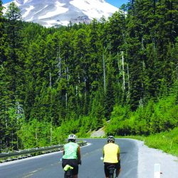 Cyclists enjoy riding on the smooth roads in the shadow of Mt. Hood