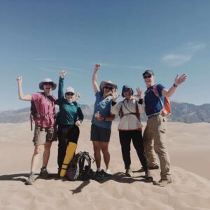 group cheering in Sand Dunes