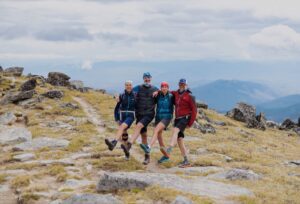 group of hikers on peak