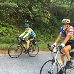 two cyclists on a road