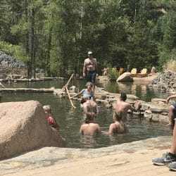 group of people in a hot springs