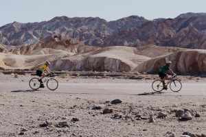 Death Valley Cyclists Passing By
