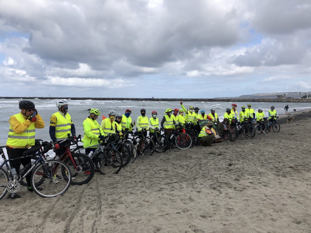 Large group of bikers on the beach