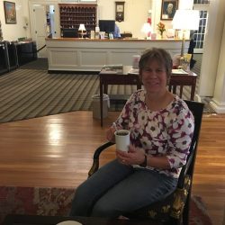 woman having coffee in hotel