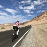 biker on a road in Death Valley
