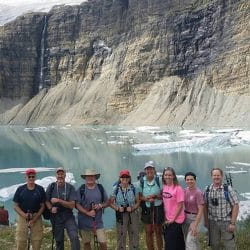 hikers in glacier national park