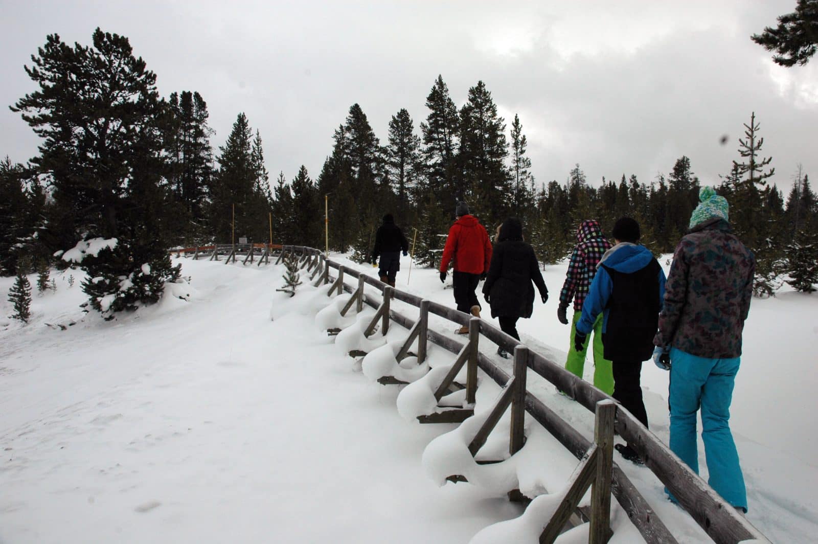 Walking the boardwalk in the snow in Yellowstone National Park